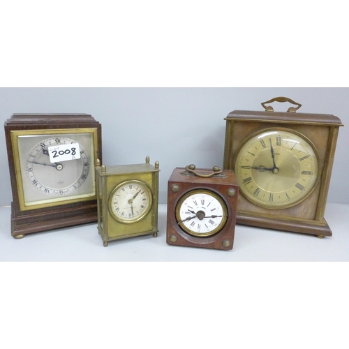 2008A - Four clocks, including an Elliott mantel clock retailed by HL Brown & Son, Sheffield