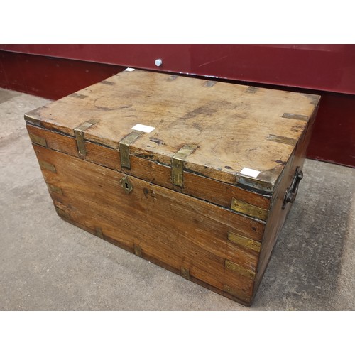 145 - A 19th Century Anglo-Indian teak and brass mounted fitted chest