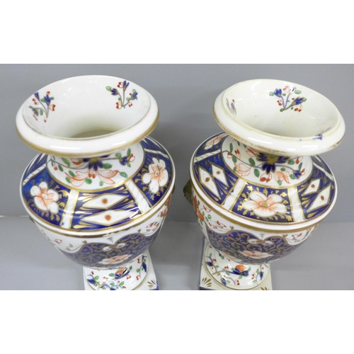 2008C - Two 19th Century Crown Derby Imari vases, one with restored rim, 23cm