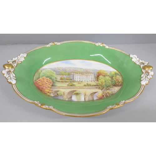 2008E - A Royal Crown Derby dish decorated in the centre with a scene of Chatsworth House, signed lower righ... 