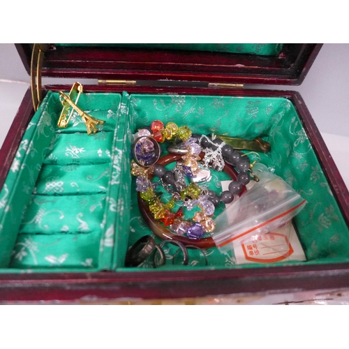 2009 - A box of costume jewellery, cufflinks, necklaces, etc.