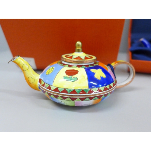 2044 - Two Charlotte di Vita enamel teapots numbered H194 and R003, boxed