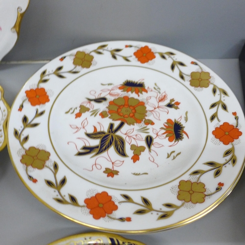 2051 - A collection of Royal Crown Derby plates, some seconds