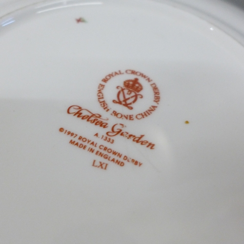 2051 - A collection of Royal Crown Derby plates, some seconds