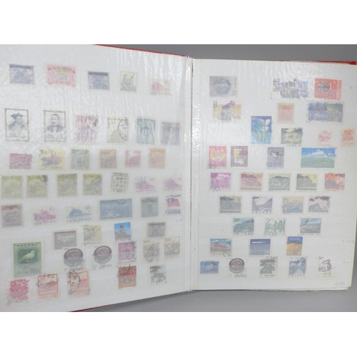 2069 - Stamps; a collection of mint and used China stamps (coiled dragons onwards) in 28 page stockbook