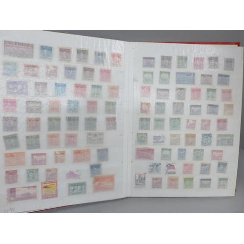 2069 - Stamps; a collection of mint and used China stamps (coiled dragons onwards) in 28 page stockbook