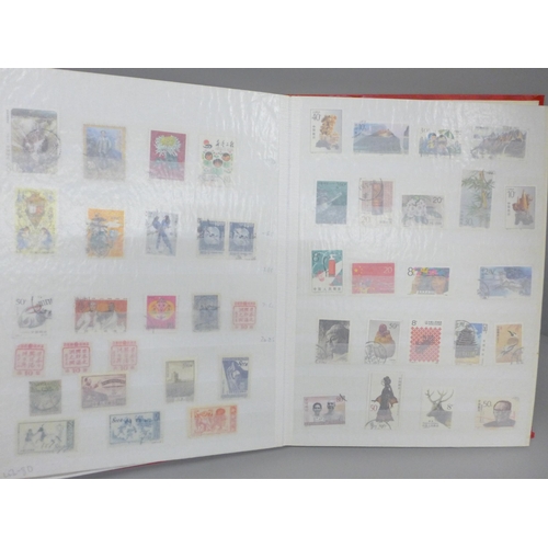 2069 - Stamps; a collection of mint and used China stamps (coiled dragons onwards) in 28 page stockbook