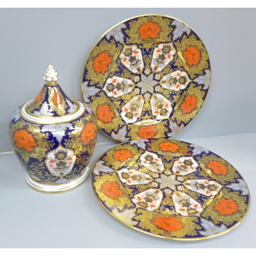 2070 - A Hamilton Imari ginger jar and two Hamilton Imari plates