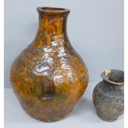 2075 - An early stoneware flask and a jug