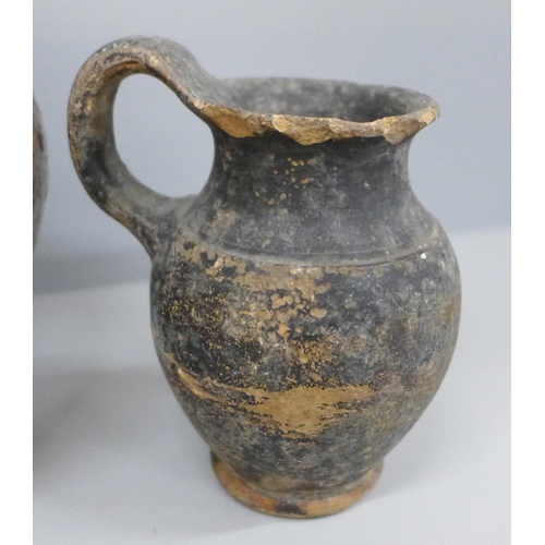 2075 - An early stoneware flask and a jug