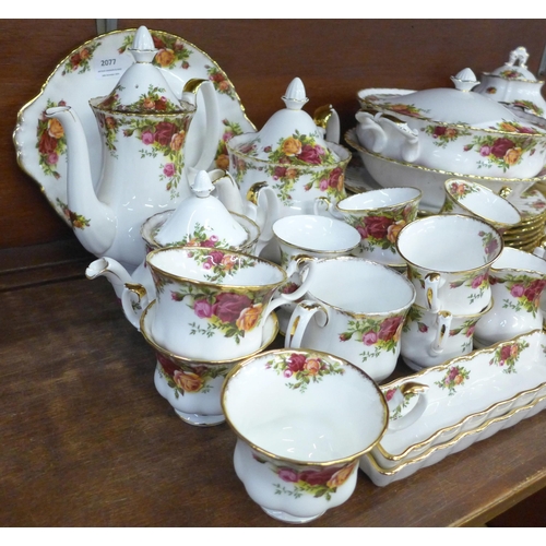 2077 - A large collection of Royal Albert Old Country Roses tea and dinner wares, six setting with eight di... 