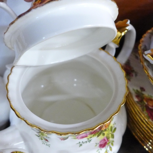 2077 - A large collection of Royal Albert Old Country Roses tea and dinner wares, six setting with eight di... 