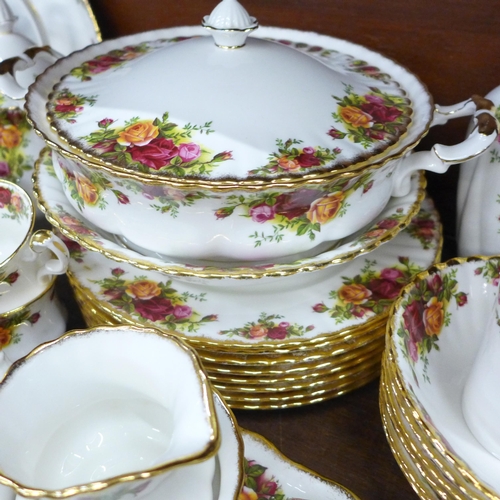 2077 - A large collection of Royal Albert Old Country Roses tea and dinner wares, six setting with eight di... 