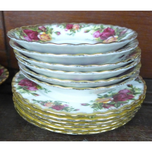 2077 - A large collection of Royal Albert Old Country Roses tea and dinner wares, six setting with eight di... 