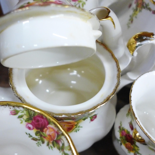 2077 - A large collection of Royal Albert Old Country Roses tea and dinner wares, six setting with eight di... 