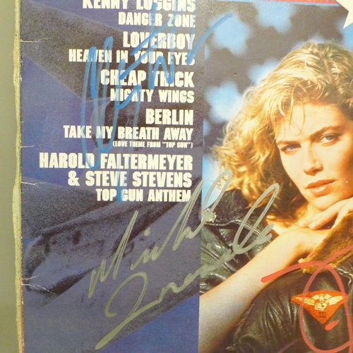 2084 - An autographed LP record, Top Gun soundtrack, featuring six signatures of cast including Tom Cruise ... 