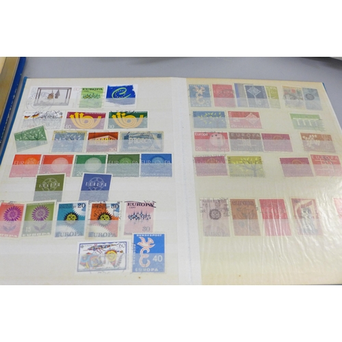 2087 - Four albums of worldwide stamps including Canada, Great Britain, Spain, Switzerland, etc.