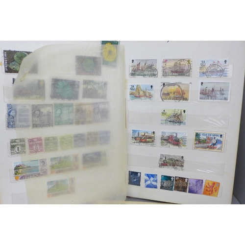 2087 - Four albums of worldwide stamps including Canada, Great Britain, Spain, Switzerland, etc.