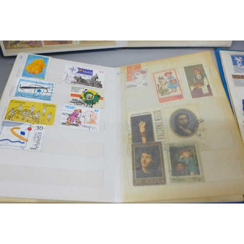 2087 - Four albums of worldwide stamps including Canada, Great Britain, Spain, Switzerland, etc.