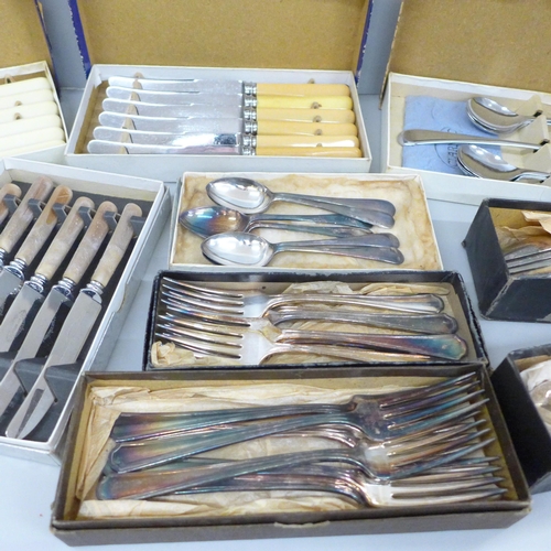 2095 - A collection of boxed silver plated flatware sets