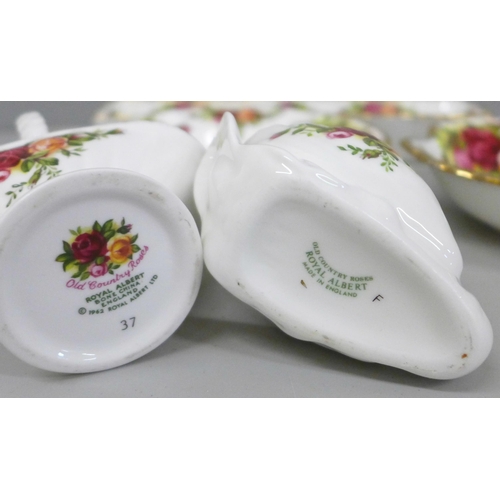 2099 - A collection of Royal Albert Country Roses; a rectangular dish, a shell shaped dish and round dish, ... 