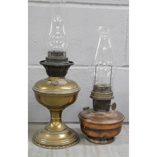 2291 - Two oil lamps **PLEASE NOTE THIS LOT IS NOT ELIGIBLE FOR IN-HOUSE POSTING AND PACKING**