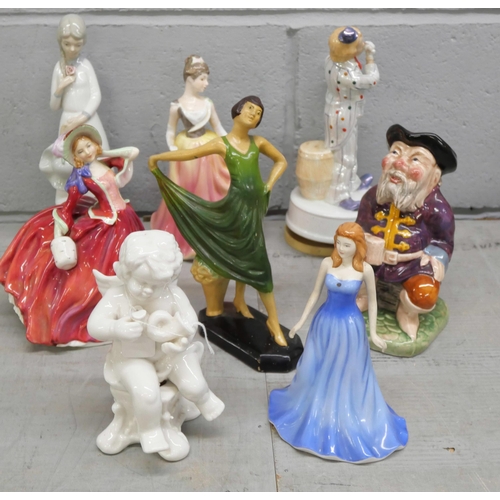 2294 - A collection of figures including Royal Doulton, Art Deco and a musical clown (8)