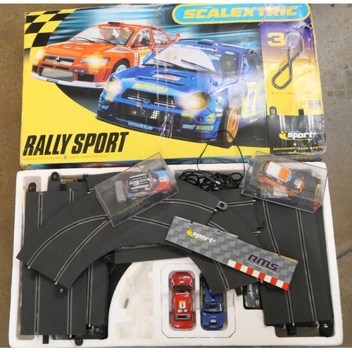 2296 - A Scalextric Rally Sport set plus two spare Scalextric Mini Coopers