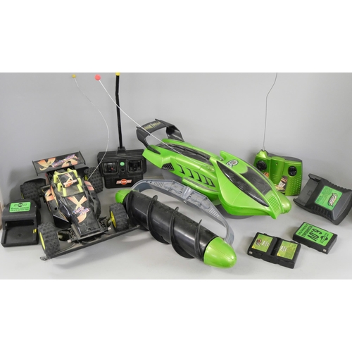 2302 - Two remote control vehicles, Tyco Terrain Twister and Hitari Turbo King, both with chargers and batt... 