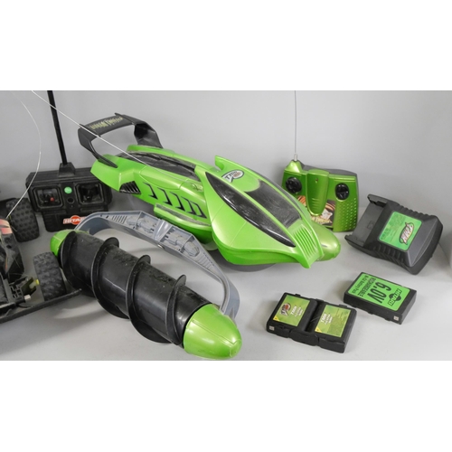 2302 - Two remote control vehicles, Tyco Terrain Twister and Hitari Turbo King, both with chargers and batt... 