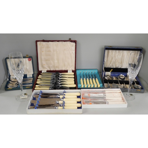 2304 - A pair of Waterford crystal flutes, boxed, together with a collection of cased cutlery sets **PLEASE... 