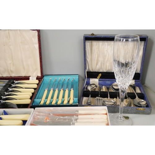 2304 - A pair of Waterford crystal flutes, boxed, together with a collection of cased cutlery sets **PLEASE... 