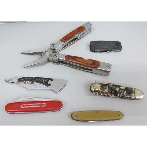 2325 - A collection of seven pocket knives and a multi-tool knife