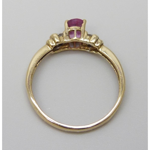 7002 - A 9ct gold, pink sapphire and diamond ring, 1.8g, N