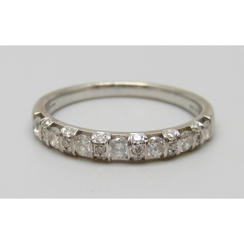 7006 - An 18ct gold and diamond ring, set with twenty-five diamonds, 3.2g, P