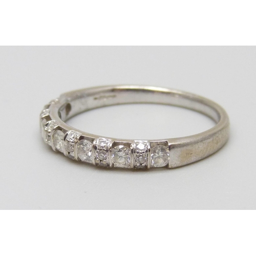 7006 - An 18ct gold and diamond ring, set with twenty-five diamonds, 3.2g, P