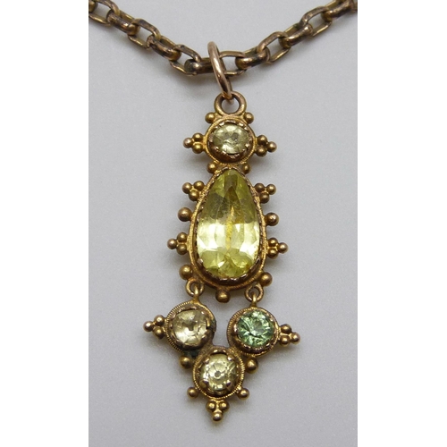 7011 - A Georgian yellow metal stone set drop pendant on a 9ct gold chain, 9.4g, chain 40cm