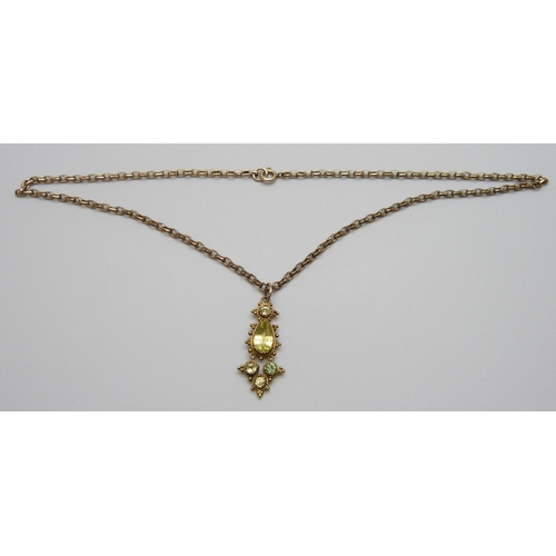 7011 - A Georgian yellow metal stone set drop pendant on a 9ct gold chain, 9.4g, chain 40cm