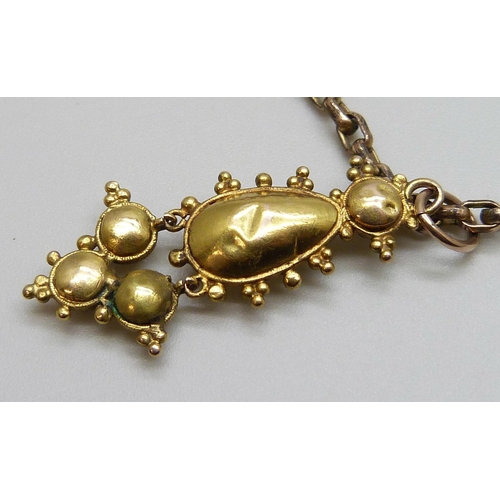 7011 - A Georgian yellow metal stone set drop pendant on a 9ct gold chain, 9.4g, chain 40cm