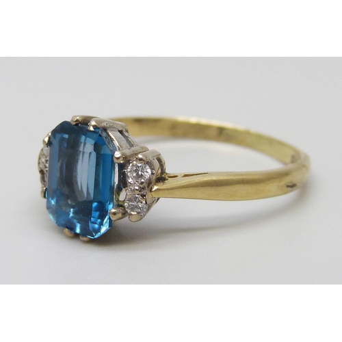 7021 - An 18ct gold, blue topaz and diamond ring, 3g, N