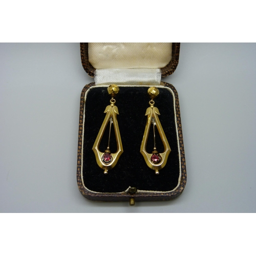 7023 - A pair of Victorian style 9ct gold drop earrings, 3.7g