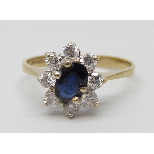 7026 - A 9ct gold, sapphire and white stone cluster ring, 1.5g, L