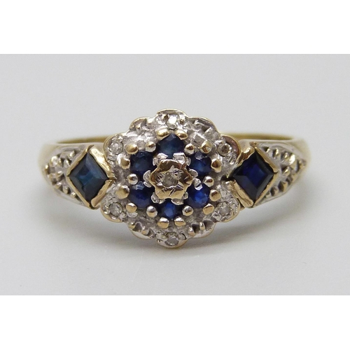 7028 - A 9ct gold, diamond and sapphire ring, 2.5g, M