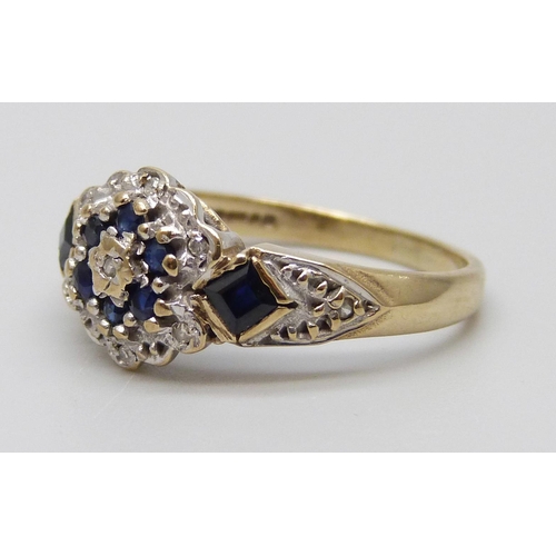 7028 - A 9ct gold, diamond and sapphire ring, 2.5g, M