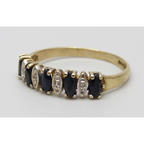 7032 - A 9ct gold, sapphire and diamond ring, 1.3g, J