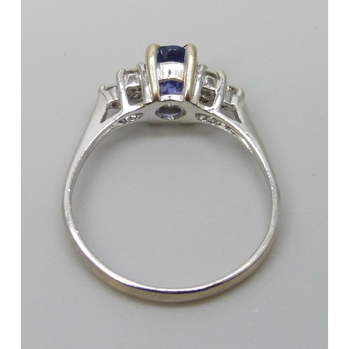 7039 - A 14ct/585 white gold, tanzanite and diamond ring, size O, 2.6g