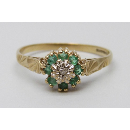 7041 - A 9ct gold, diamond and emerald ring, 1.5g, P