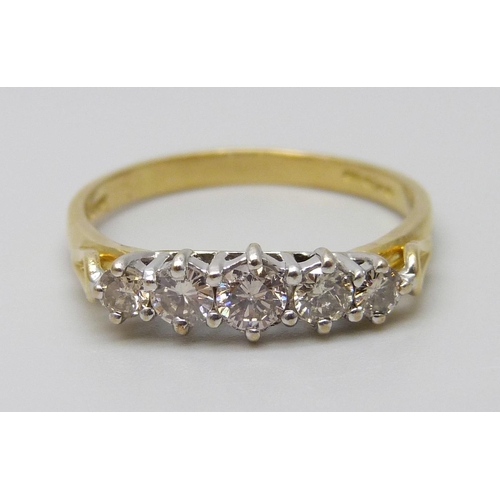 7042 - An 18ct gold five stone diamond ring, diamond weight 0.50 carat stamped to band, size N, 2.2g