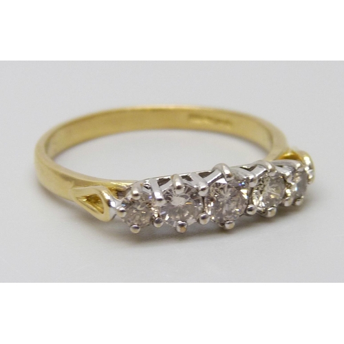 7042 - An 18ct gold five stone diamond ring, diamond weight 0.50 carat stamped to band, size N, 2.2g