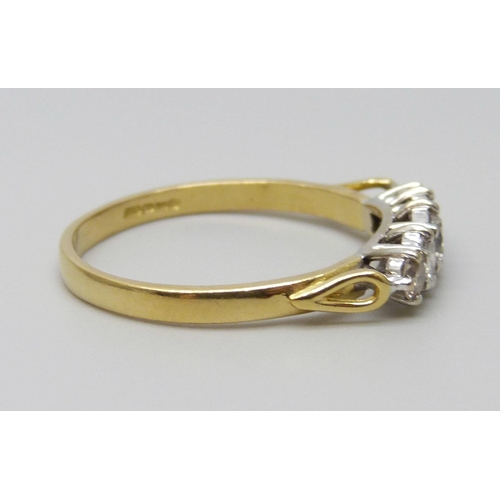 7042 - An 18ct gold five stone diamond ring, diamond weight 0.50 carat stamped to band, size N, 2.2g